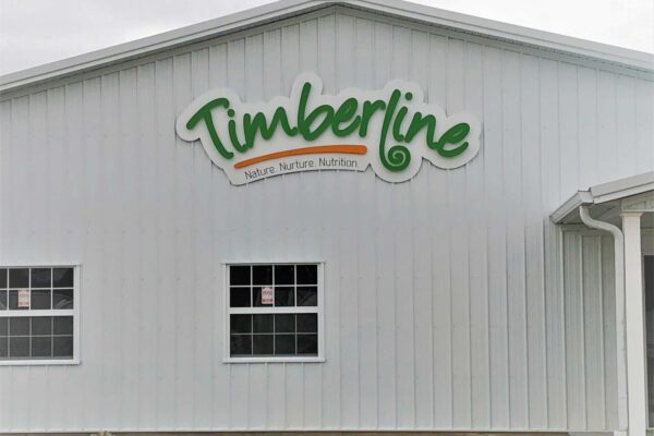 Timberline sign outside company building