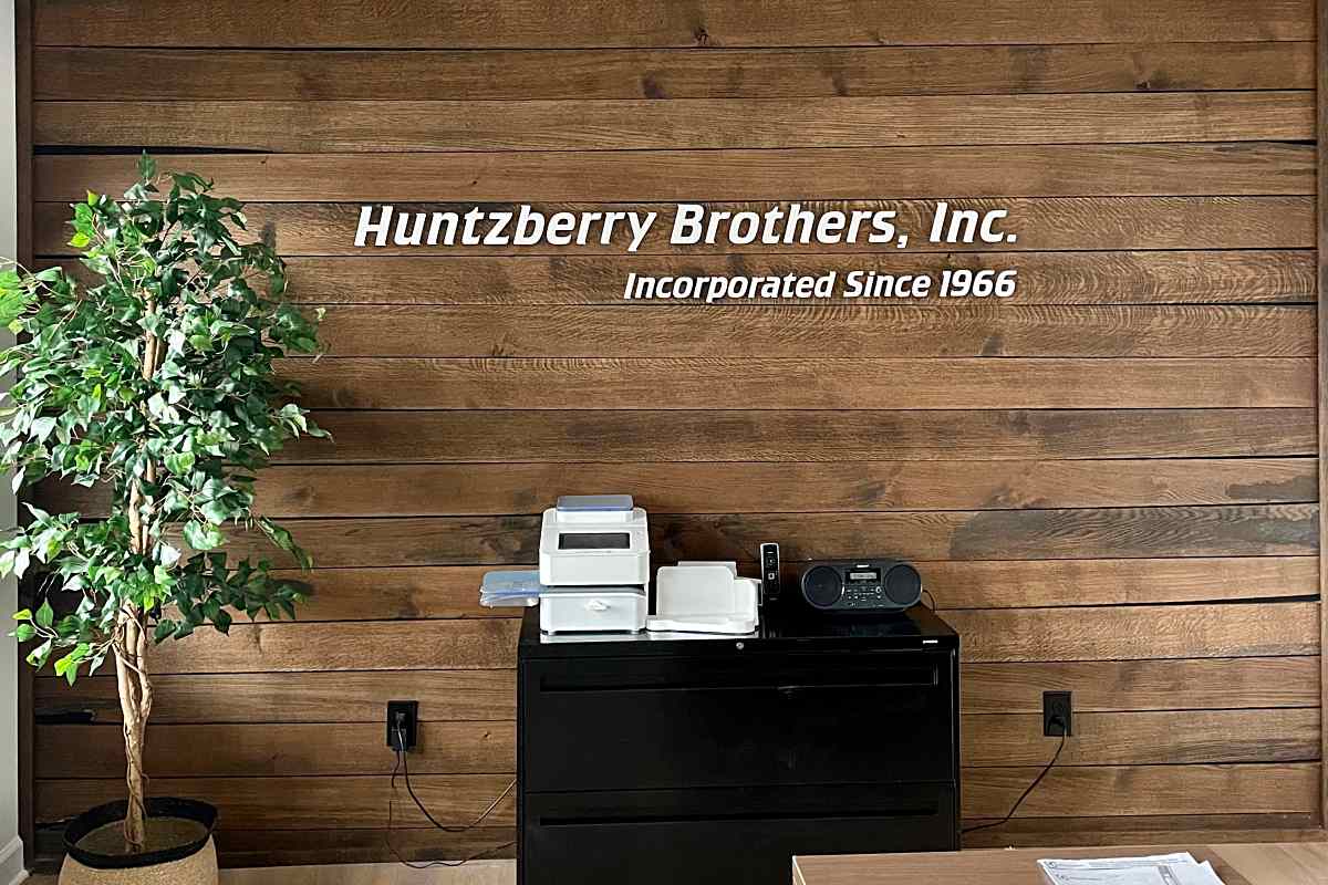 Huntzberry Brothers custom metal office sign