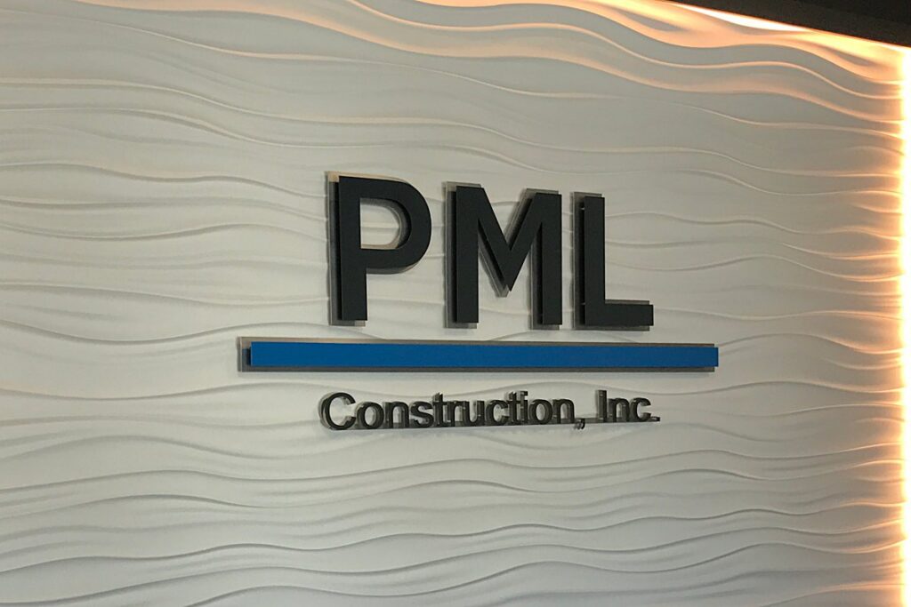 PML Construction custom office lobby sign