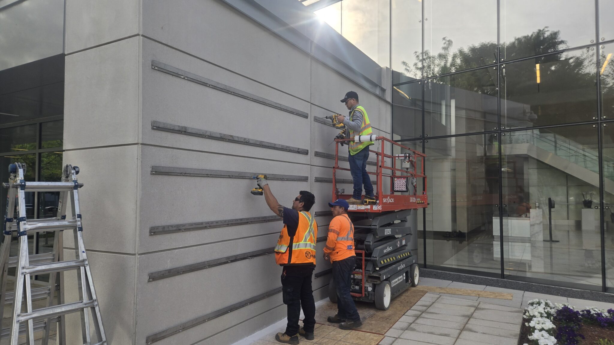 Crew drilling mounting rails