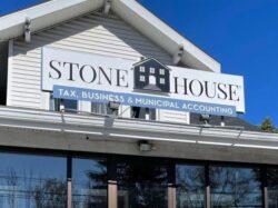 Stone House Tax, Business & Municipal Accounting sign above the storefront windows, shot from the street.