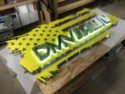 DMV Iron sign being shipped and packaged