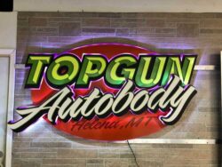 custom illuminated sign for the topgun autobody shop in helena montana
