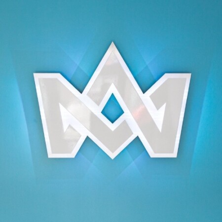 A 3d mockup of Coronation Media crown monogram against a blue wall.